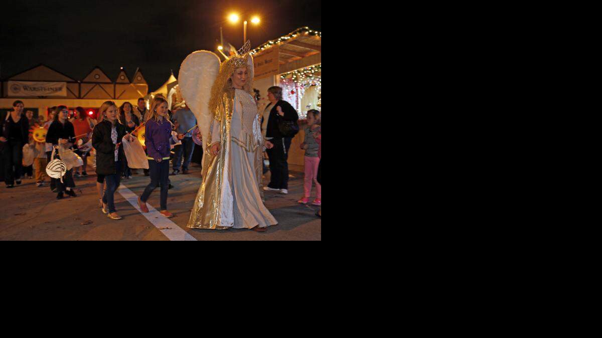 
Christkindl Angel leads a parade of children through last year’s Arlington Christkindl Market.
