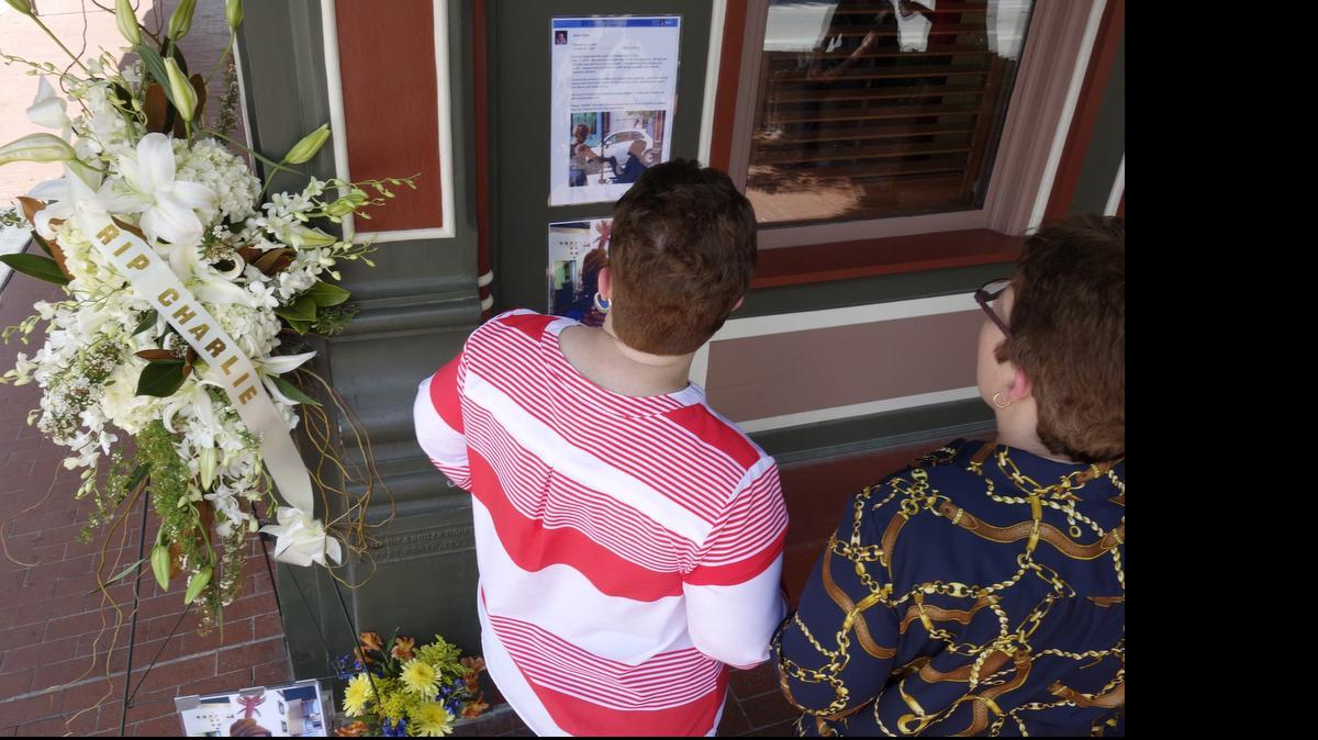 
Impromptu memorial sprung up Monday for Charles Joyner, who sat on the corner of Third and Houston and greeted passersby from his wheelchair for years..
