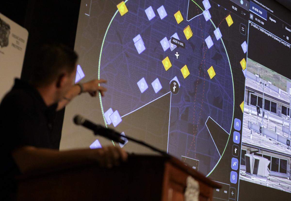 Sgt. Erik Lavigne with the Fort Worth Police Department points at a map that shows reported crimes during a drone demonstration at the Bob Bolen Public Safety Complex on Thursday, June 4, 2026. The drone will also be used to help the Fort Worth Fire Department locate fires.