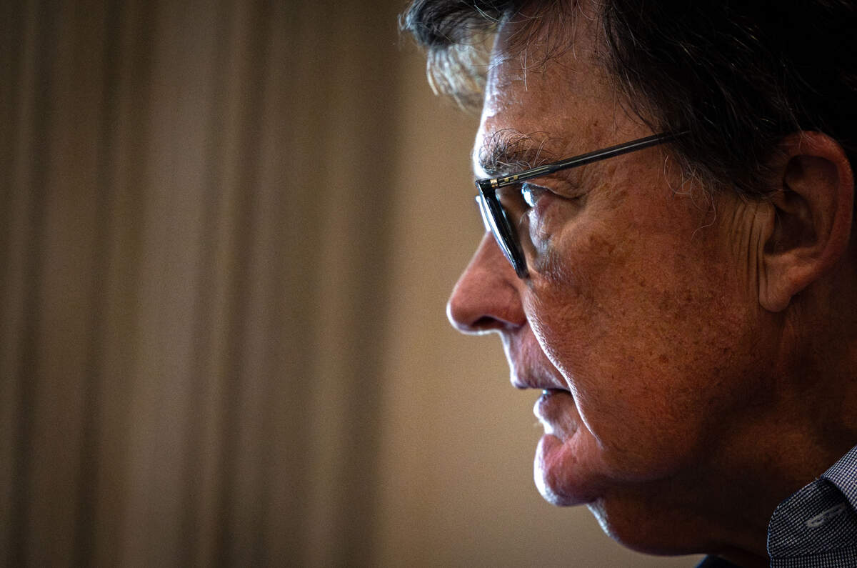 02 - EMC_TCU Growth.jpg Michael Johnston stares out of a window inside of his home in Fort Worth on July 6, 2026. One of Johnston's biggest worries is that single family homes near Texas Christian University are being used as short-term rentals.