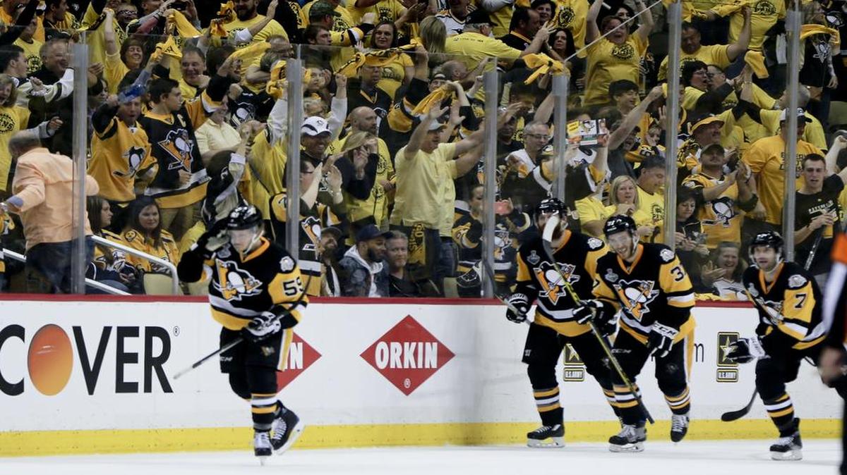 The Pittsburgh Penguins and their fans celebrate after Jake Guentzel’s go-ahead, third-period goal Monday in their 5-3 victory over the Nashville Predators in Game 1 of the Stanley Cup Final. Game 2 is scheduled for 7 p.m. Wednesday and will be televised at 7 p.m. on NBCSN.