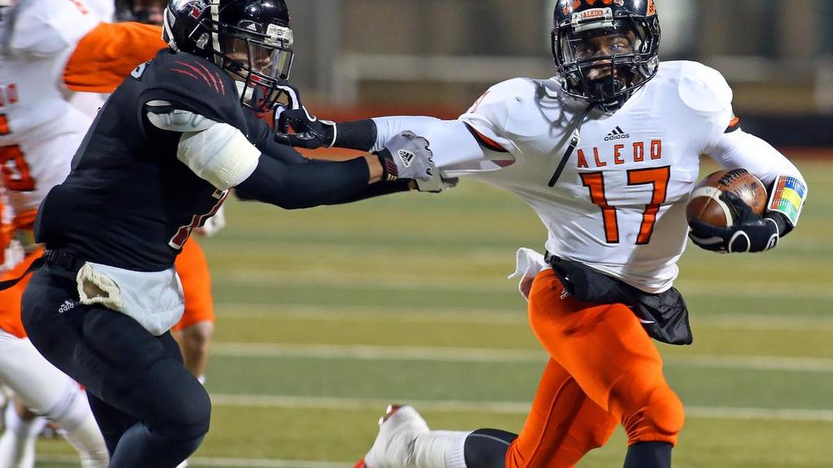 Aledo WR Ryan Newsome (17) runs the ball against Wichita Falls during the 2013-14 season.