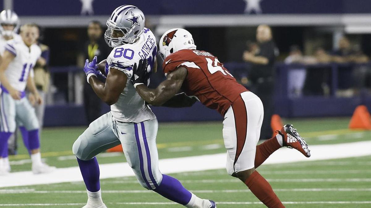 Dallas Cowboys tight end Rico Gathers (80) makes the catch infront of Arizona Cardinals linebacker Haason Reddick (43) during the second half of a preseason NFL football game on Sunday, August 26, 2018 at AT&T Stadium in Arlington, Texas. (Special to the Star-Telegram/Ray Carlin)