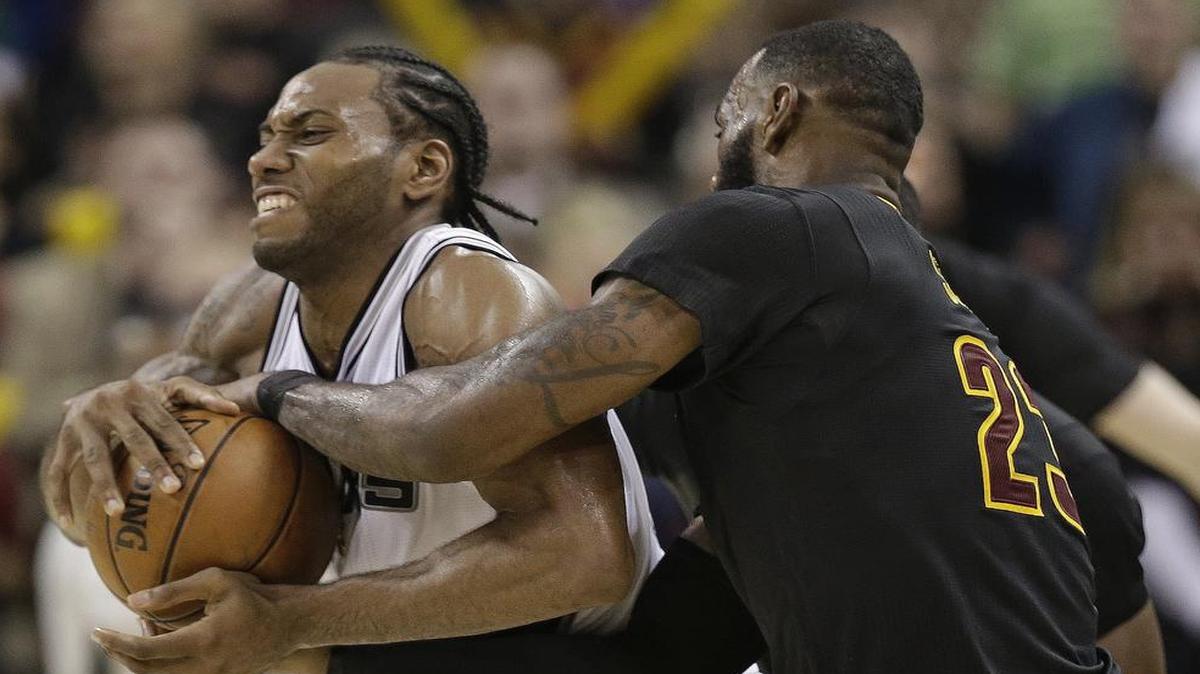 MVP candidates Kawhi Leonard, left, and LeBron James tangle Monday when the San Antonio Spurs play host to the Cleveland Cavaliers. TNT has the telecast starting at 7 p.m.