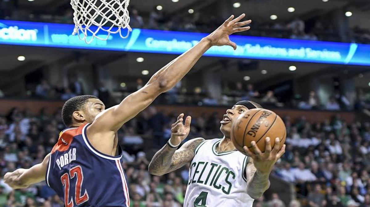 The Washington Wizards and Otto Porter Jr., left, look to contain the Boston Celtics and point guard Isaiah Thomas after he scored a career-high 53 points in Tuesday’s overtime victory. The Celtics own a 2-0 series lead heading into Thursday’s Game 3, which will be televised at 7 p.m. on ESPN.
