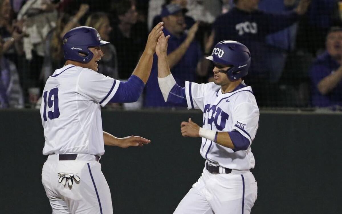Dane Steinhagen, right, had three hits for TCU, including a two-run home run in the eighth inning against Louisiana-Lafayette.