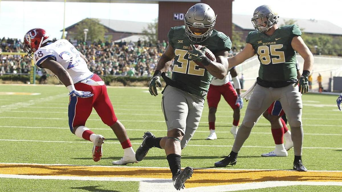Baylor running back Shock Linwood (32) and the Bears visit the Texas Longhorns in a Big 12 game Saturday at 2:30 p.m. on WFAA/8.