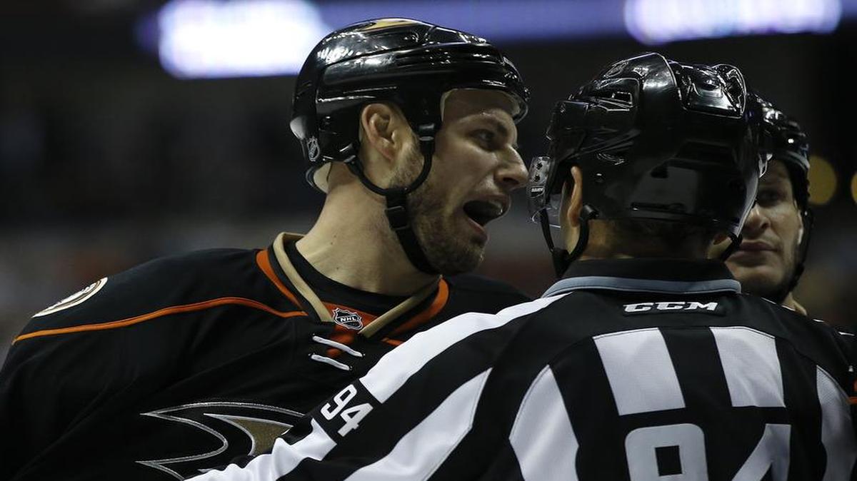Anaheim Ducks center Ryan Getzlaf is restrained by a linesman during the second period of an NHL hockey game against the Ottawa Senators in Anaheim, Calif., Sunday, Dec. 11, 2016. Getzlaf and the Ducks visit the Dallas Stars at 7:30 p.m. Tuesday at American Airlines Center in Dallas. The telecast is on FSSW. The Ducks are coming off a 5-1 victory over the Senators.