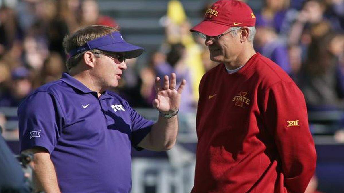 
TCU coach Gary Patterson talks with Iowa State coach Paul Rhodes before their game on Dec. 6, the season finale. TCU won the game 55-3, finishing an 11-1 regular season.
