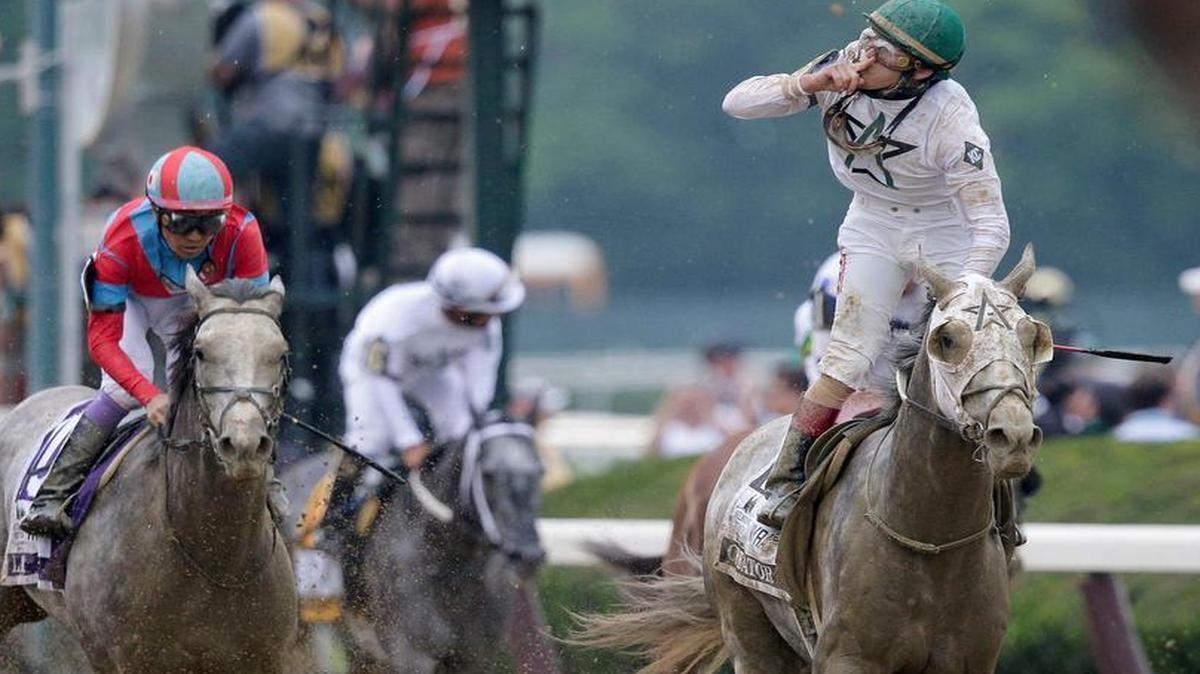 Irad Ortiz Jr., riding Creator, celebrates after winning the 148th running of the Belmont Stakes horse race, Saturday, June 11, 2016, in Elmont, N.Y.