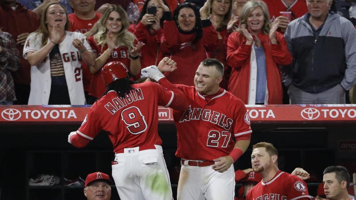 Cameron Maybin, left, 2016 AL MVP Mike Trout and the Los Angeles Angels play host to the Texas Rangers on Tuesday in the opener of a three-game series. The game will be televised at 9 p.m. on Fox Sports Southwest.