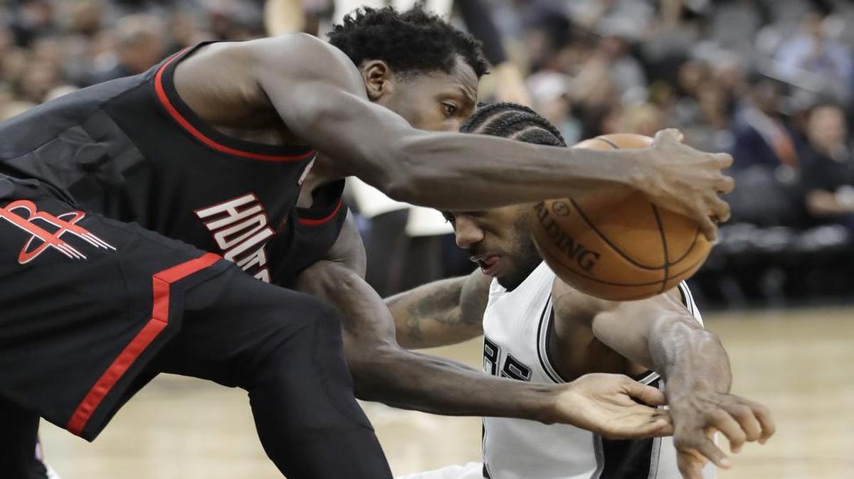 Kawhi Leonard, right, and the San Antonio Spurs try to bounce back Wednesday after being floored by Patrick Beverley and the Houston Rockets 126-99 Monday in Game 1 of their Western Conference semifinal series. Game 2 tips off at 8:30 p.m. on TNT.
