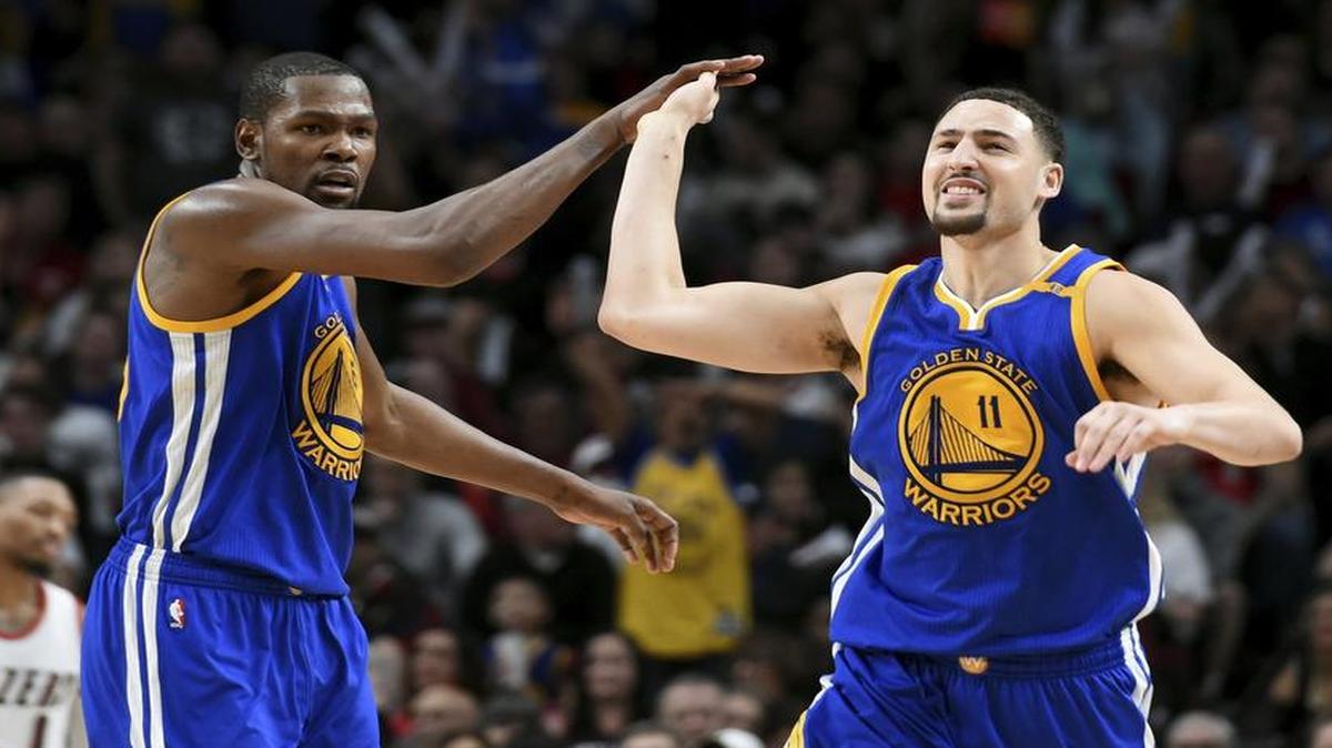 Kevin Durant, left, Klay Thompson and the Golden State Warriors travel down the West Coast to face the Clippers in Los Angeles on Thursday. The marquee matchup will be televised at 9:30 p.m. on TNT.