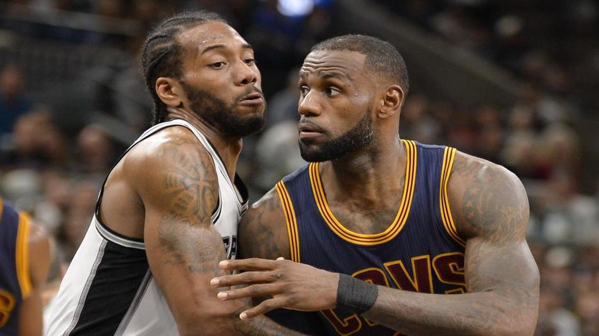 Kawhi Leonard, left, guarding LeBron James, scored 25 points Monday as the San Antonio Spurs walloped the Cleveland Cavaliers 103-74. Leonard and the Spurs are back in action Wednesday when they host the Western Conference-leading Golden State Warriors.