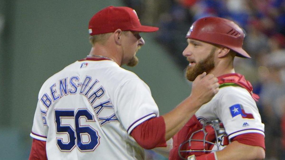 Longtime minor league pitcher Austin Bibens-Dirkx, left, conferring with catcher Jonathan Lucroy on May 17, is scheduled to make his first major league start Wednesday for the Rangers against the Tampa Bay Rays. The game will be televised at 7 p.m. on Fox Sports Southwest.
