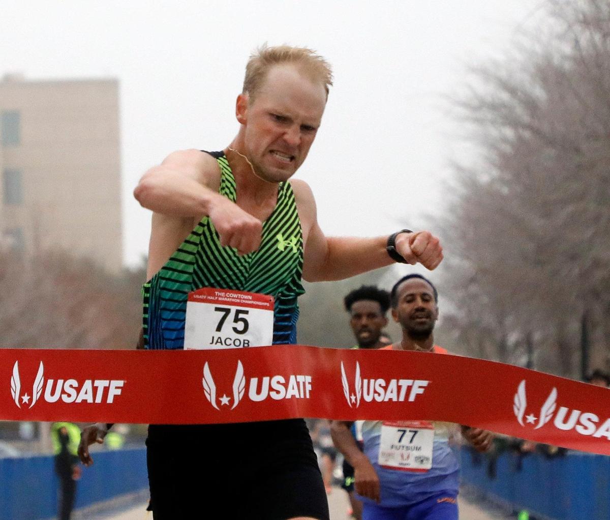 Jacob Thompson wins the half marathon for the USA Track & Field championship with a time of 1:02.38 during the 2023 Cowtown Marathon in Fort Worth, Texas, Sunday, Feb. 26, 2023. Almost 21,000 runners registered for the two day event. (Special to the Star-Telegram Bob Booth)