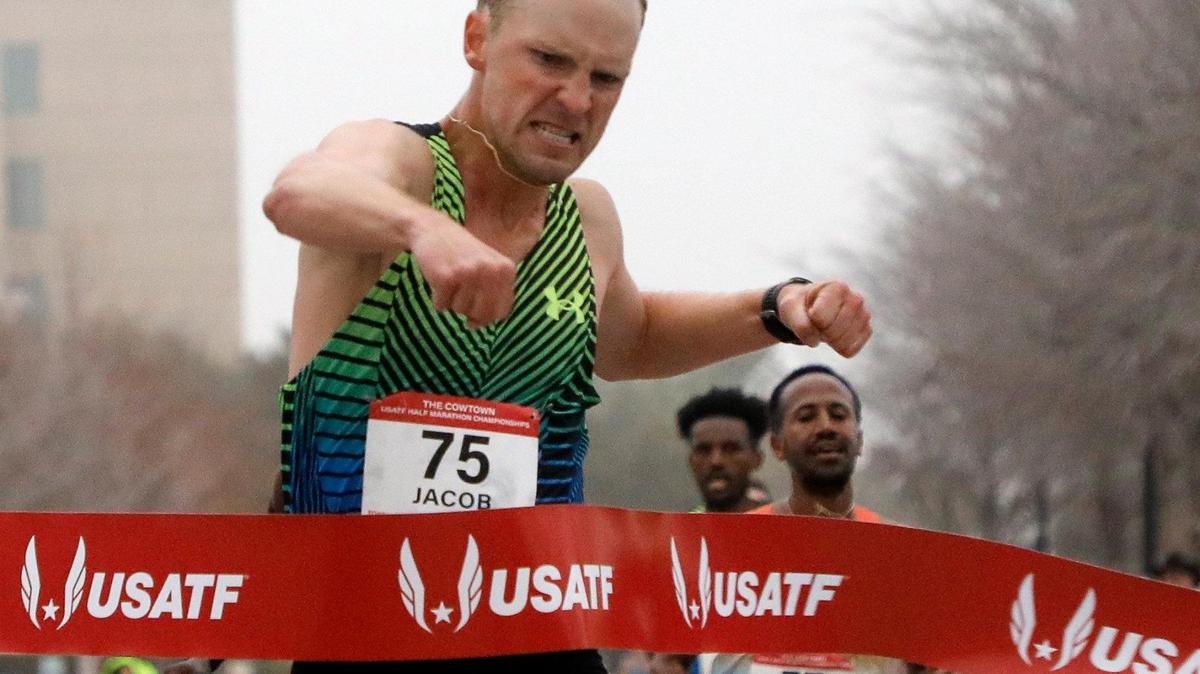 Jacob Thompson wins the half marathon for the USA Track & Field championship with a time of 1:02.38 during the 2023 Cowtown Marathon on Sunday.