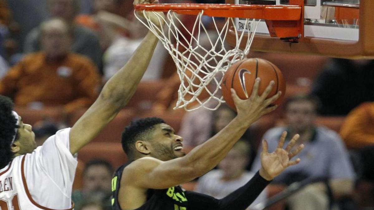 Baylor guard Al Freeman, right, in action Saturday against Texas and Jarrett Allen, and the Bears open play Thursday in the Big 12 tournament quarterfinals against Kansas State. The game will be televised at 8:30 p.m. on ESPNU.