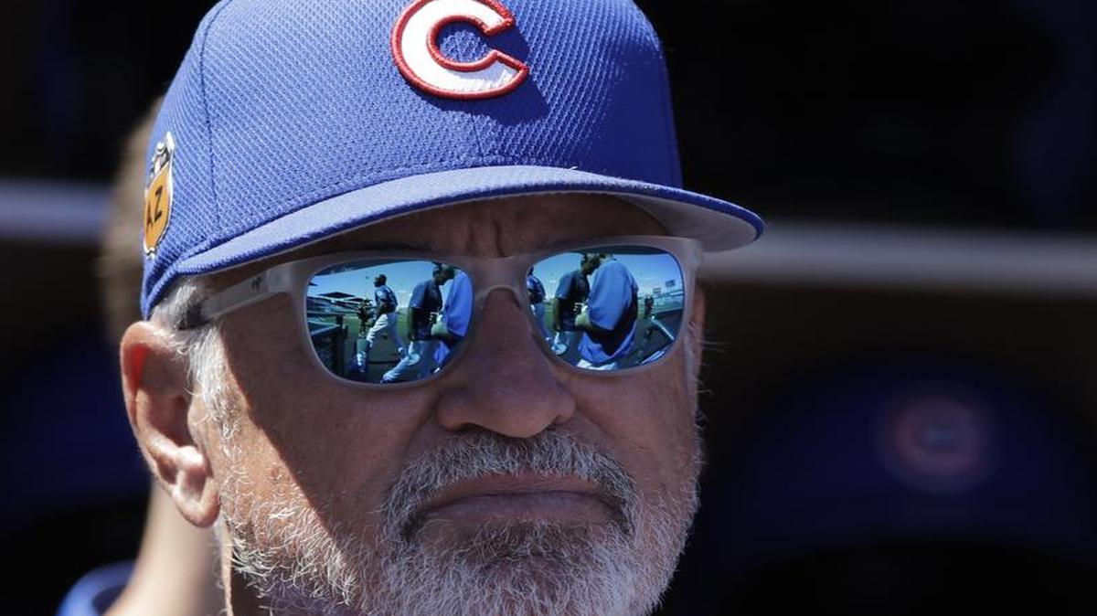 Chicago Cubs manager Joe Maddon and his players take the field Sunday in St. Louis as reigning world champions of baseball for the first time since 1909 when they face the Cardinals at 7:30 p.m. on ESPN.
