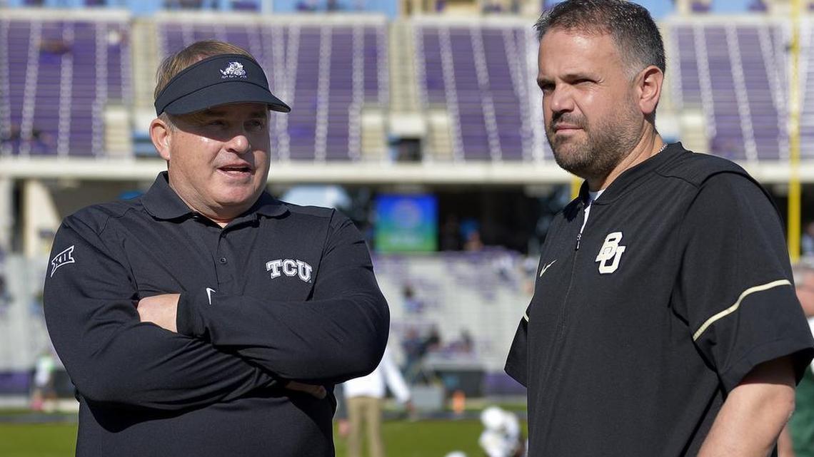 TCU coach Gary Patterson, left, talks with first-year Baylor coach Matt Rhule during pregame activities Friday at Amon G. Carter Stadium. After the game, Patterson announced he had signed a new six-year contract to stay with TCU.