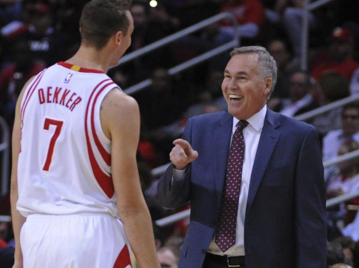 Houston Rockets head coach Mike D’Antoni laughs with Sam Dekker in a 134-95 victory over the Los Angeles Lakers.
