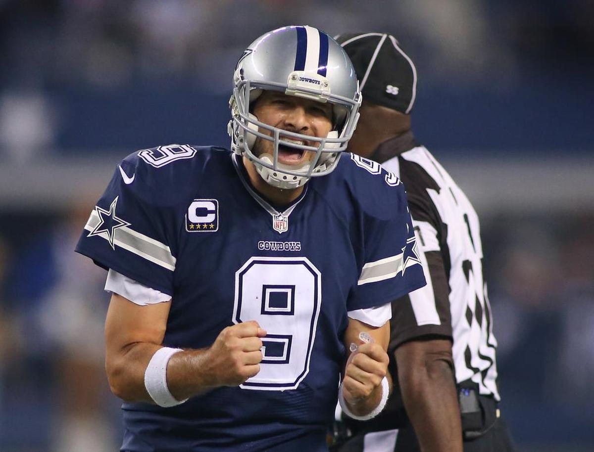 Dallas Cowboys quarterback Tony Romo (9) yells “c’mon” at wide receiver Cole Beasley (11) after Beasley failed to catch a third quarter pass as the Philadelphia Eagles beat the Dallas Cowboys 33-10 in Arlington, Texas, Thursday, November 27, 2014.