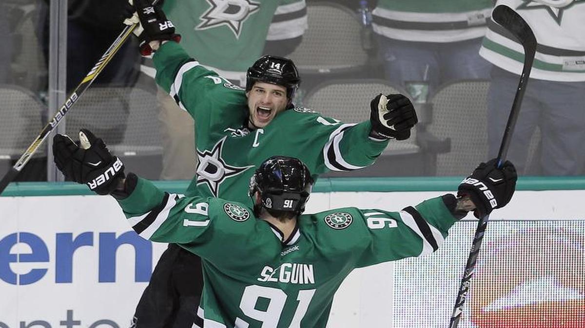 Jamie Benn, top, celebrates his winning goal Monday night with Tyler Seguin as the Dallas Stars defeated the Minnesota Wild 3-2 to snap a nine-game losing streak in overtime games dating to last season. The Stars travel to Nashville on Wednesday to take on the Predators. Game time is 7:30 p.m. and it will be televised on FSSW Plus.
