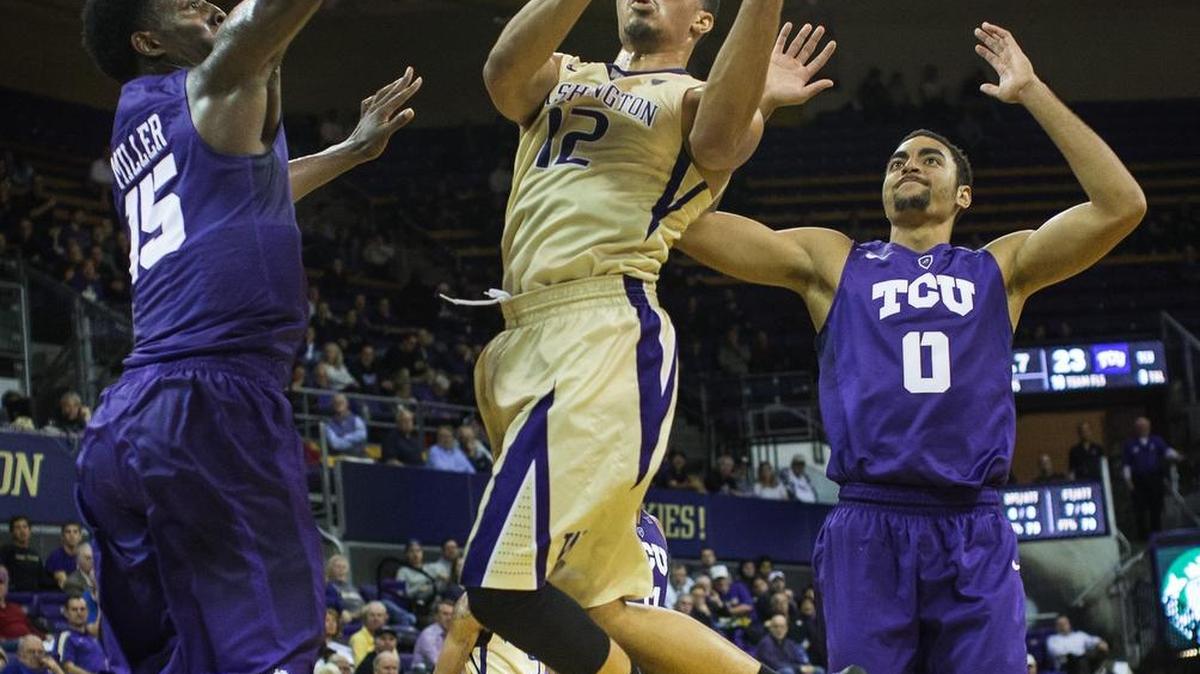 Washington’s Andrew Andrews, who scored a game-high 32 points including six 3-pointers, sails into the lane against TCU on Tuesday in Seattle.
