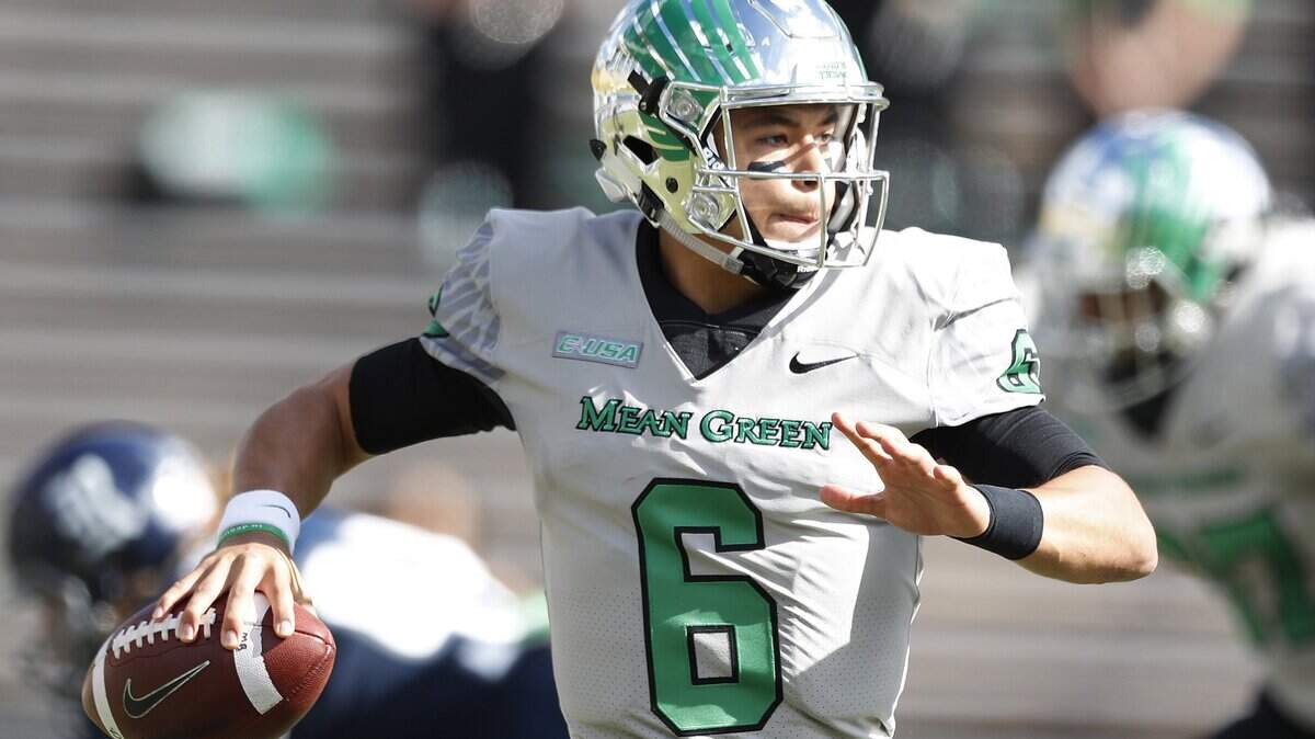 North Texas quarterback Mason Fine looks to pass during a game in the 2017 season.