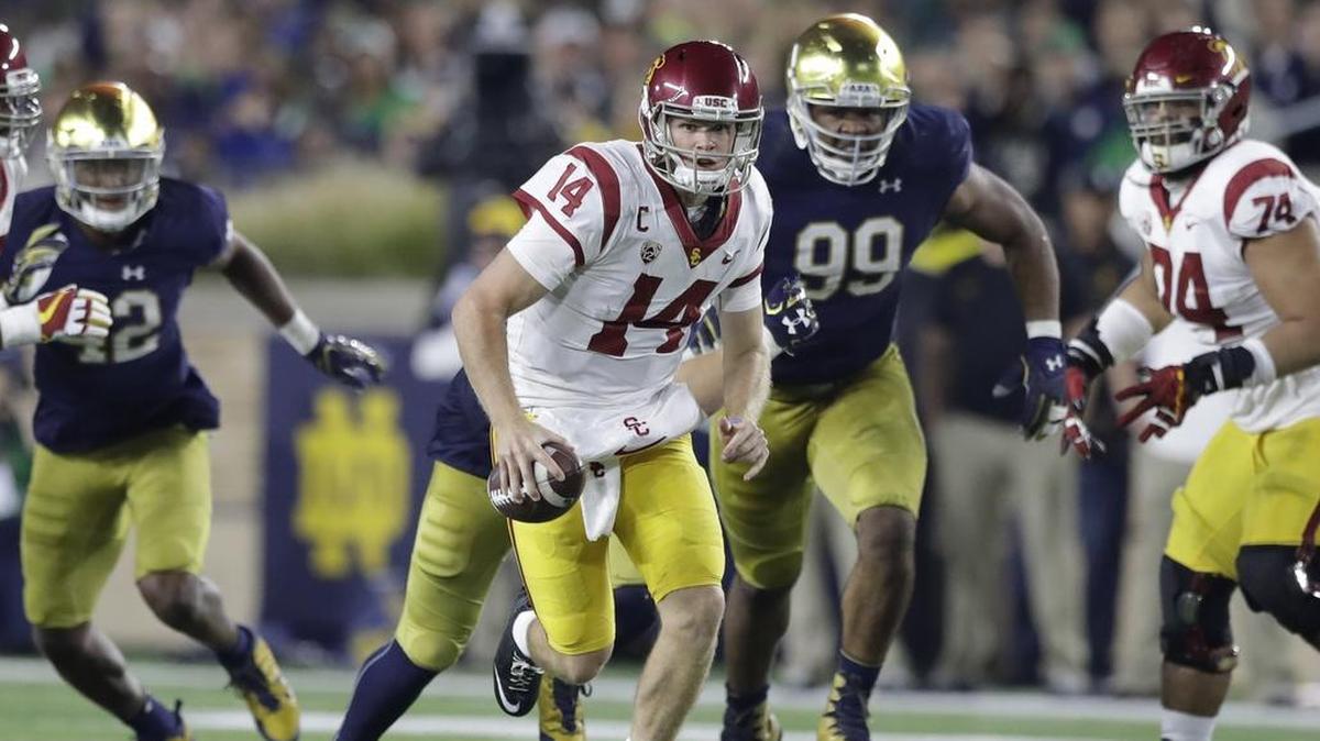 USC QB Sam Darnold will try to get the Trojans by a big favorite in Ohio State tonight in the Cotton Bowl Classic. (AP Photo/Carlos Osorio, File)