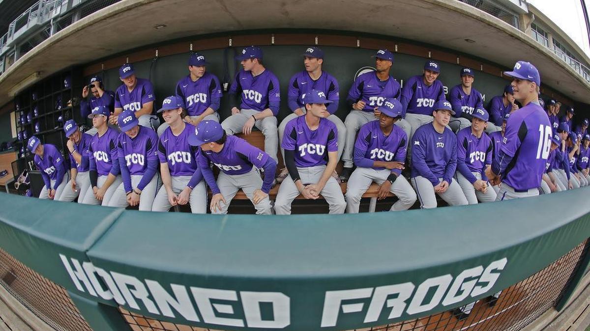 TCU gathers in the dugout before taking the field at Lupton Stadium for practice on Jan. 26. The Horned Frogs were picked No. 2 in the Big 12 preseason coaches’ poll, one vote behind Texas Tech.