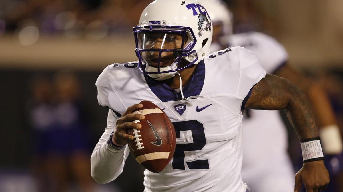 TCU quarterback Trevone Boykin looks upfield on a scramble during the Nov. 7 game at Oklahoma State. The senior was named a finalist for the Davey O’Brien Award, the position’s top honor.
