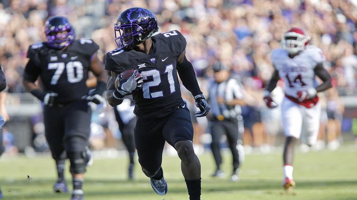 TCU running back Kyle Hicks scores on a 61-yard pass play in the first quarter of an Oct. 1 game against Oklahoma at Amon G. Carter Stadium. The junior from Arlington Martin leads the team in rushing and is tied for the team lead in receptions and touchdown runs.