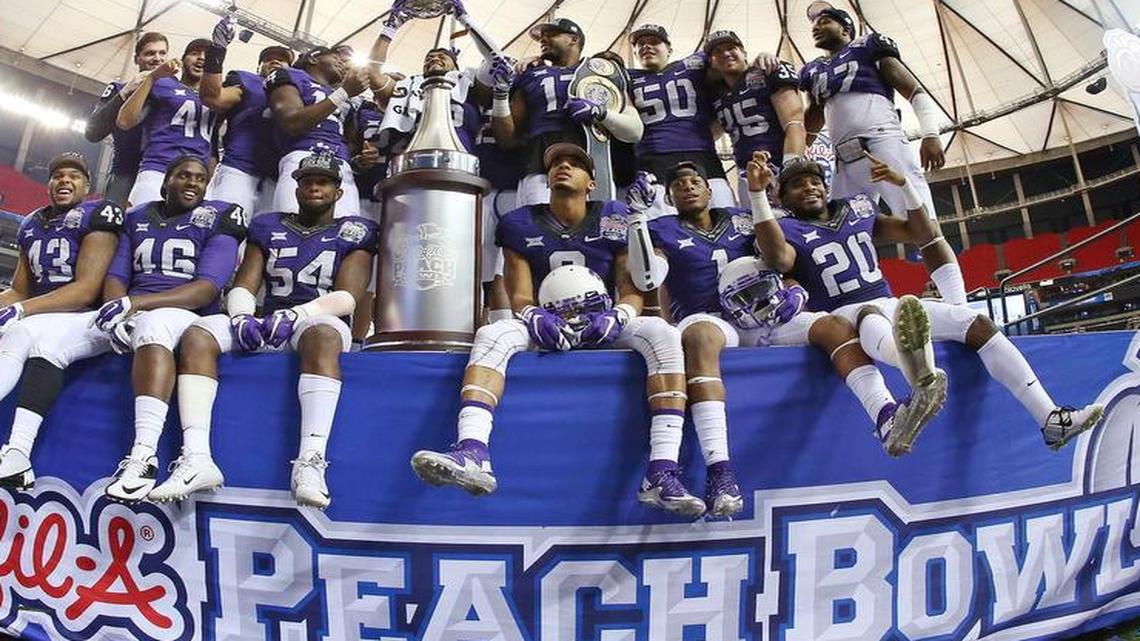 
TCU wound up in the Peach Bowl last season, beating Mississippi 42-3, after Ohio State vaulted into the fourth and final playoff spot by trouncing Wisconsin in the Big Ten title game. 


