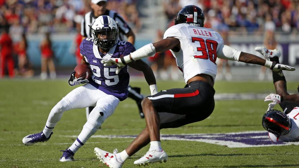 TCU receiver KaVontae Turpin makes a move against Texas Tech defensive back Kisean Allen during first-half action last week at Amon G. Carter Stadium. It was Turpin’s first game back since recovering from a knee injury on Sept. 17.