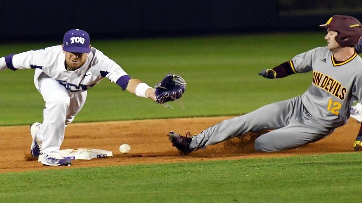 TCU shortstop Ryan Merrill can’t handle a throw from the catcher as Arizona State’s Gage Canning slides safely into second. The Sun Devils beat top-ranked TCU 13-9 in the first of a three-game weekend series at Lupton Stadium.