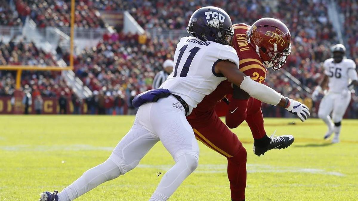 TCU cornerback Ranthony Texada makes the hit on Iowa State receiver Matthew Eaton on a catch near the goal line during first-half action of an Oct. 28 game at Jack Trice Stadium in Ames, Iowa.