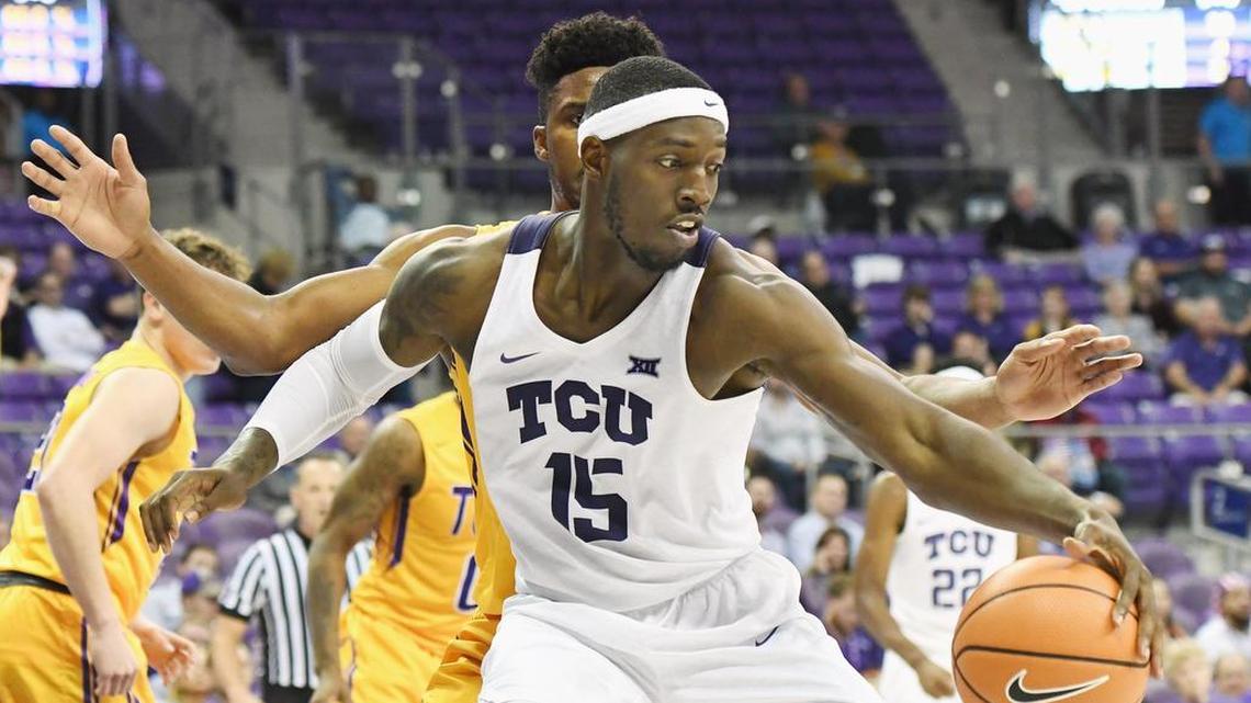 TCU forward JD Miller makes a move against the defense of Tennessee Tech’s Micaiah Henry during a Nov. 13 game at Schollmaier Arena. Miller had 17 points and nine rebounds in the Horned Frogs’ 100-63 victory, the lone loss of the season so far for Tennessee Tech.
