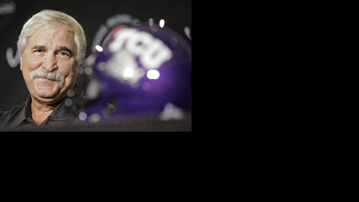 
Dick Bumpas served as TCU defensive coordinator the past 11 seasons. Three years in a row (2008-10) the Horned Frogs had the nation’s top defense. Bumpas is retiring after nearly 40 years of coaching.



