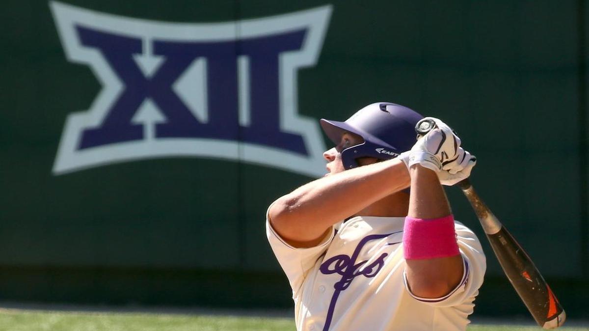 TCU designated hitter Luken Baker follows the flight of the ball on a double in the fifth inning against West Virginia on Sunday. He also homered and doubled again, driving in five runs for a team-high 24 on the season.