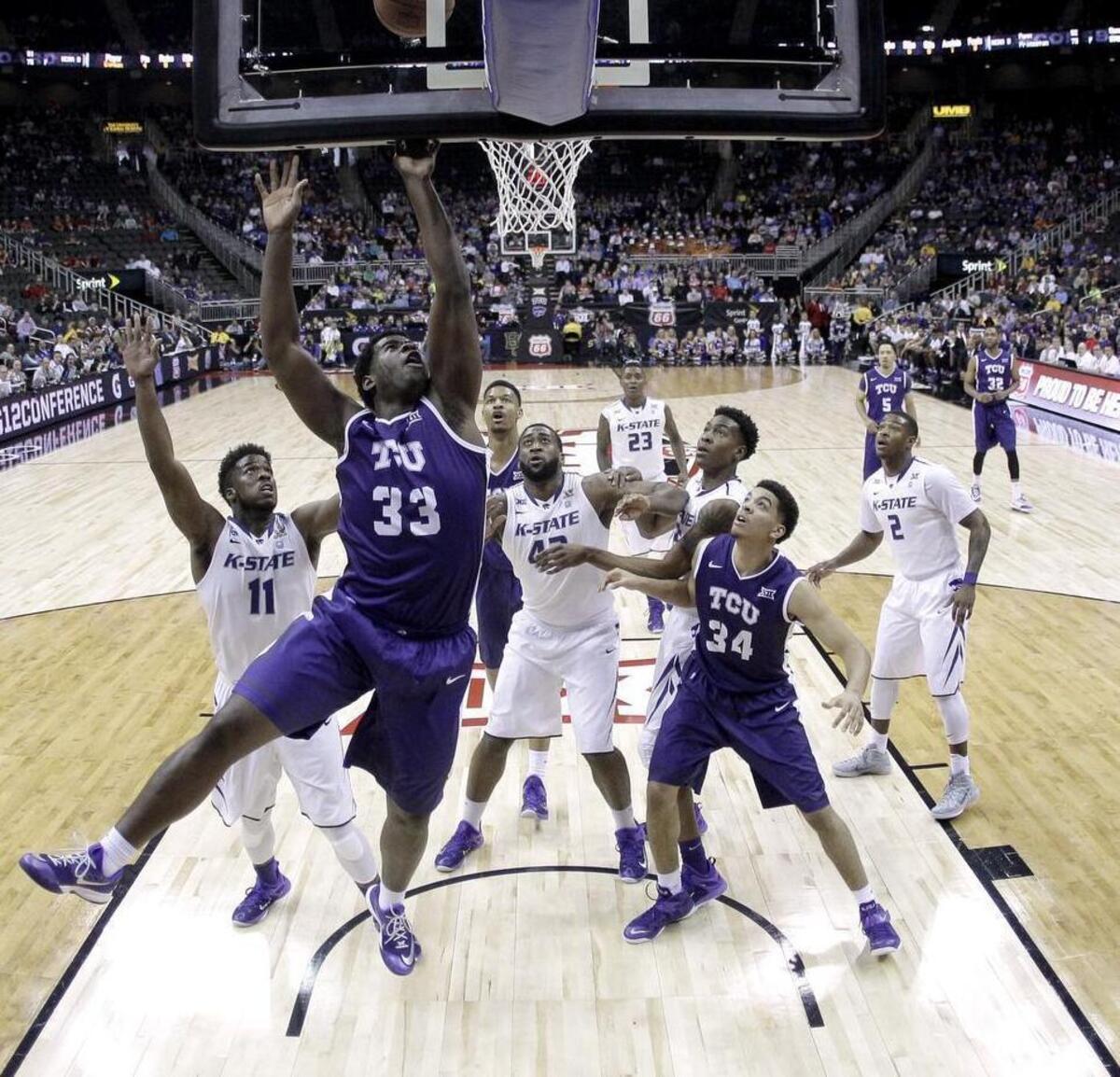 
TCU forward Chris Washburn puts up a shot against Kansas State during last season’s Big 12 tournament. The Horned Frogs won 67-65 for their first victory in the tournament ever.
