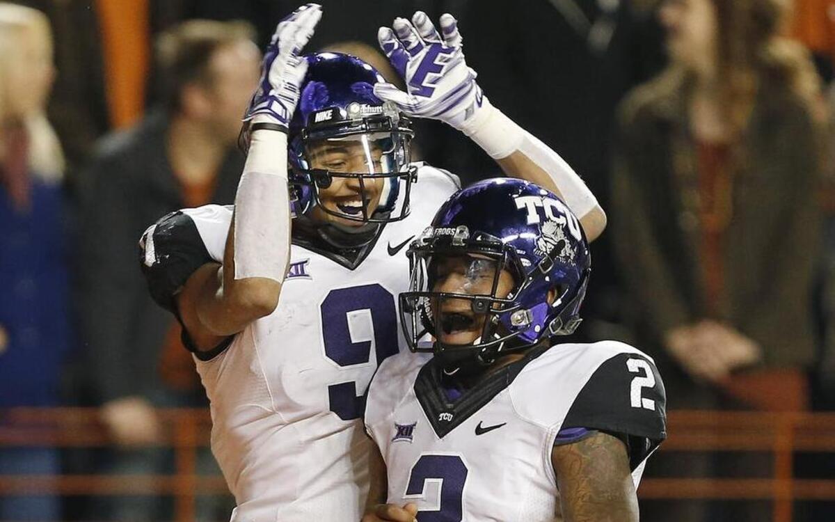 
Josh Doctson, left, with Trevone Boykin, says it’s key to stay humble despite a high ranking.

