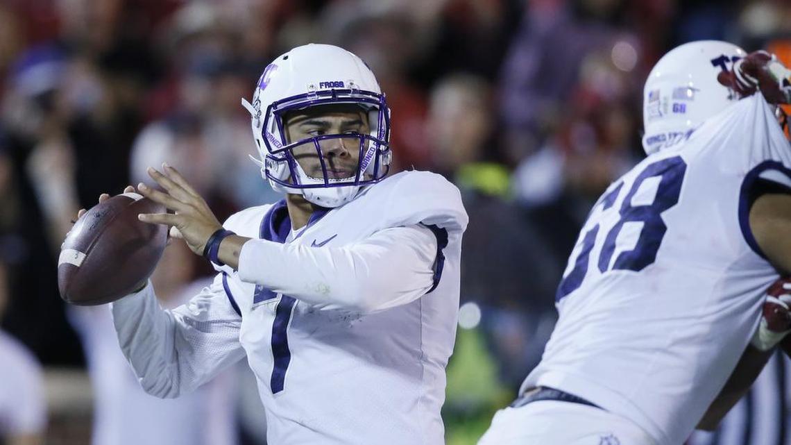 TCU quarterback Kenny Hill looks to pass during action against Oklahoma at Gaylord Family Oklahoma Memorial Stadium in a Nov. 11 game in Norman. Hill sat out last week’s game against Texas Tech.