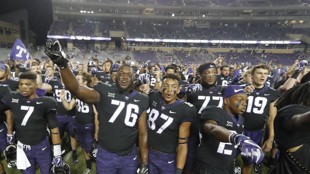 The TCU Horned Frogs celebrate with fans following a 63-0 victory against Jackson State in the 2017 season opener Sept. 2 at Amon G. Carter Stadium.