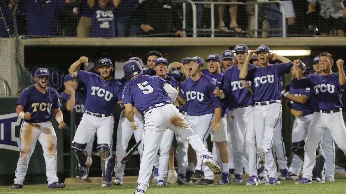 
The TCU dugout reacts to Derek Odell after he scores the tying run in the ninth inning against N.C. State on Monday night. The senior third baseman led off the inning with a single, finishing 2-for-3 with three runs scored.
