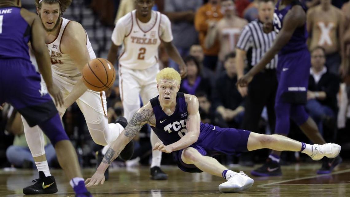 TCU guard Jaylen Fisher goes for loose ball during second-half action Wednesday night against Texas at the Erwin Center in Austin. Fisher had 15 points and a chance at the game-winning shot in the double-overtime game.