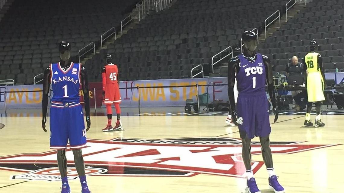 Team uniforms on display on the Sprint Center court for Big 12 Media Day in Kansas City on Tuesday.