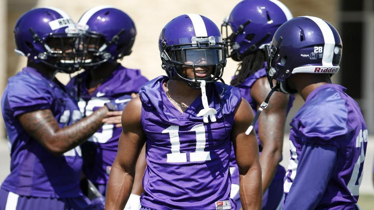 TCU cornerback Ranthony Texada talks with a teammate during practice Aug. 5. Texada will resume his starting position in 2016 after being sidelined in Week 3 last season.
