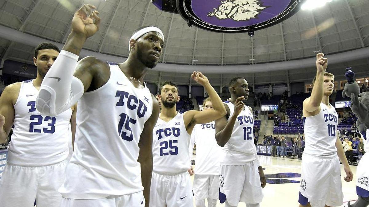 TCU’s Ahmed Hamdy-Mohamed, left, JD Miller, Alex Robinson, Kouat Noi and Vladimir Brodziansky sing the school song after beating Belmont 87-76 on Nov. 29 at Schollmaier Arena in Fort Worth.