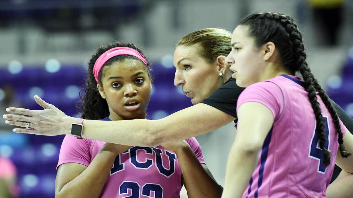 TCU guard AJ Alix, left, getting instructions from TCU coach Raegan Pebley along with teammate Amber Ramirez on Feb. 18, had 12 points and seven assists in Monday’s loss at Texas Tech.